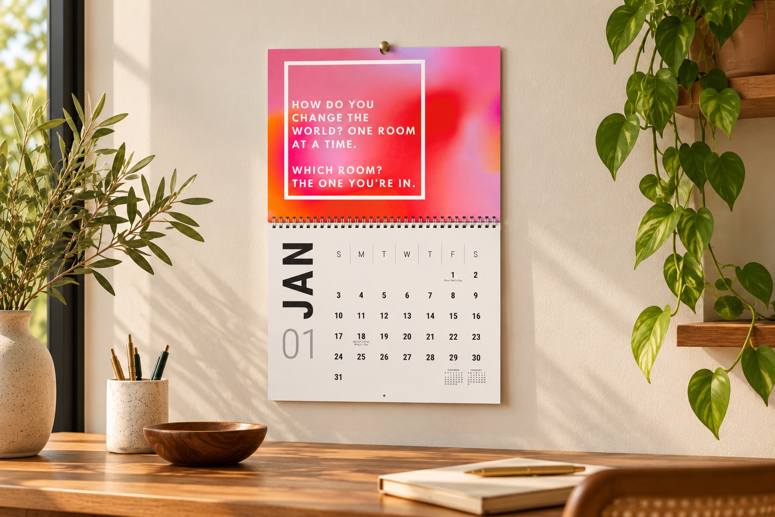 Block by Block 2027 wall calendar displayed in a bright workspace